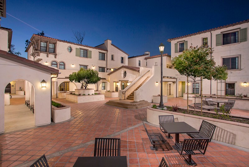 Terraces at Santiago sits amidst older industrial and commercial uses on a highly constrained urban infill site of less than an acre near the Santa Ana Regional Transportation Center.